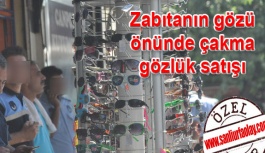 Zabıtanın gözü önünde çakma gözlük satışı