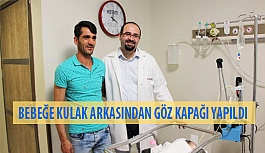 Bebeğe Kulak Arkasından Göz Kapağı Yapıldı